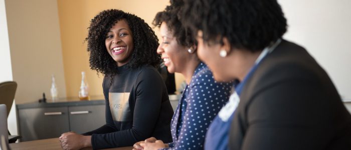 smiling-laughing at meeting